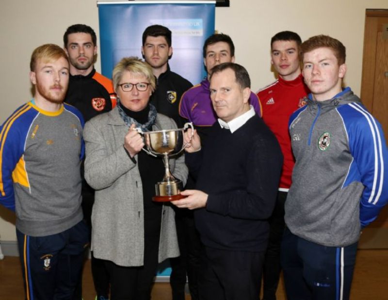 Colm McLarnon, Kickham’s Secretary and son of the late Paddy McLarnon and Angela Callan from the tournament sponsors the Bank Of Ireland with captains from six of the club’s taking part. Included are Deaglan Murphy (Rossa), Brendan Laverty (Lavey), Aidan Rushe (Crossmaglen), James Guinness (Carryduff), Stephen Cunningham (Donaghmoyne) and Daniel Kerr (Galbally).